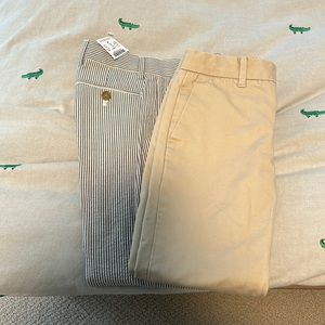 Two pairs of slim cut size 6 boys pants.
